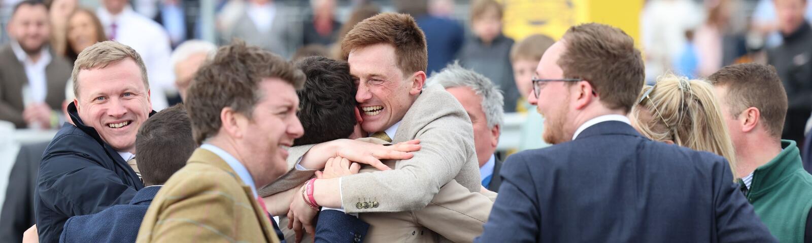 Excited crowd celebrating a win.