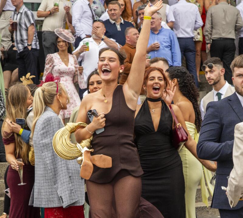 Young race goers at Newcastle cheering for the races