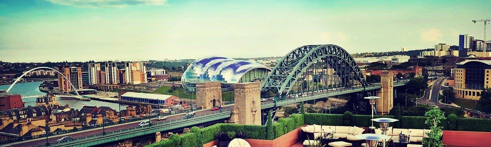 Panoramic view of the Newcastle town featuring the Tyne bridge.
