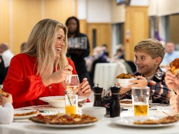 A mother and son enjoying hospitality at Newcastle Races